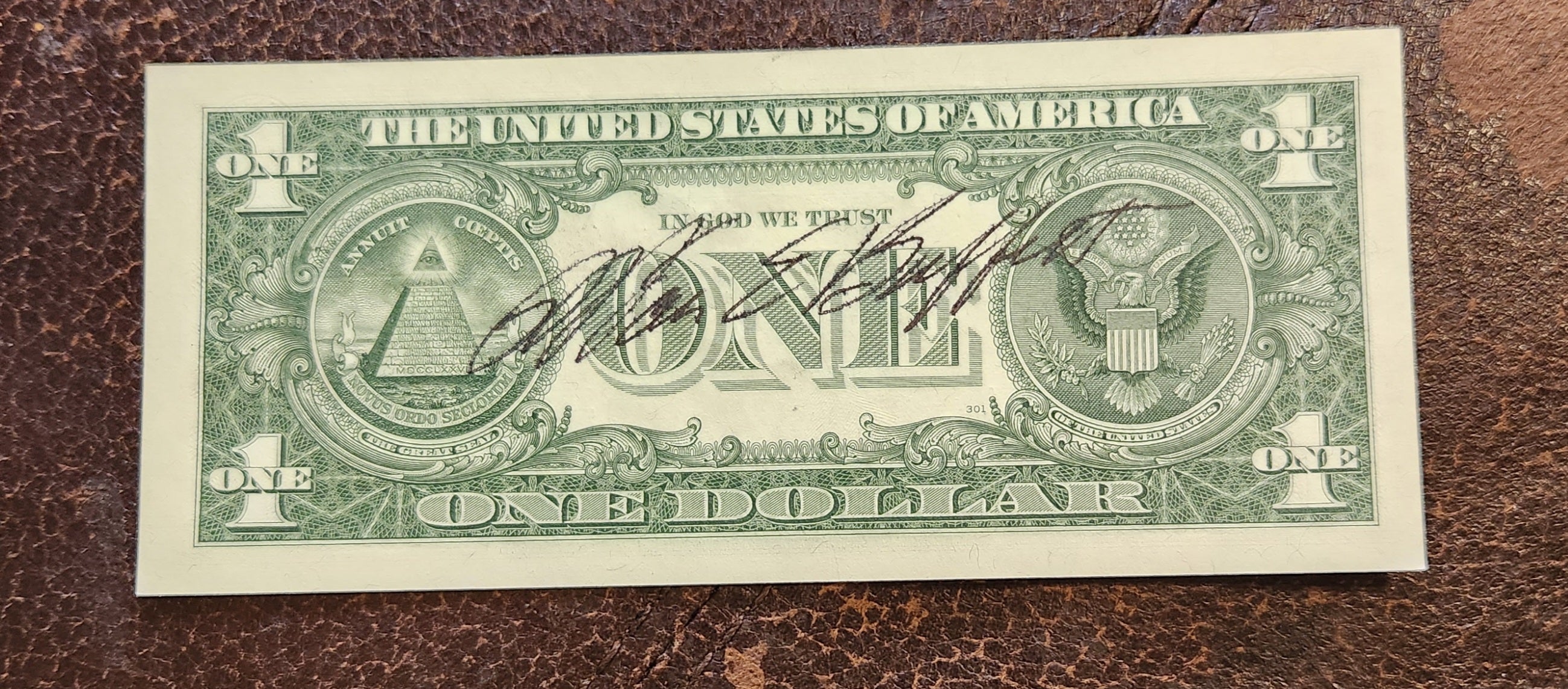 BILLIONAIRE BUSINESS MAGNATE WARREN BUFFETT HAND SIGNED ONE DOLLAR BILL