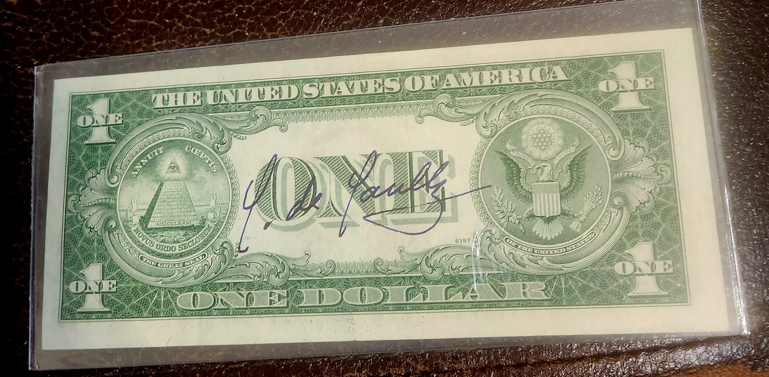 LEGENDARY FRENCH LEADER CHARLES DE GAULLE HAND SIGNED ONE DOLLAR BILL D.1970