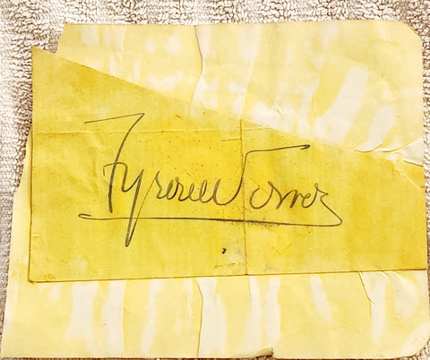 ACTOR TYRONE POWER HAND SIGNED PAGE D.1958 WATER DAMAGED