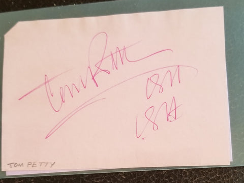 ROCK LEGEND TOM PETTY HAND SIGNED PAGE D.2017