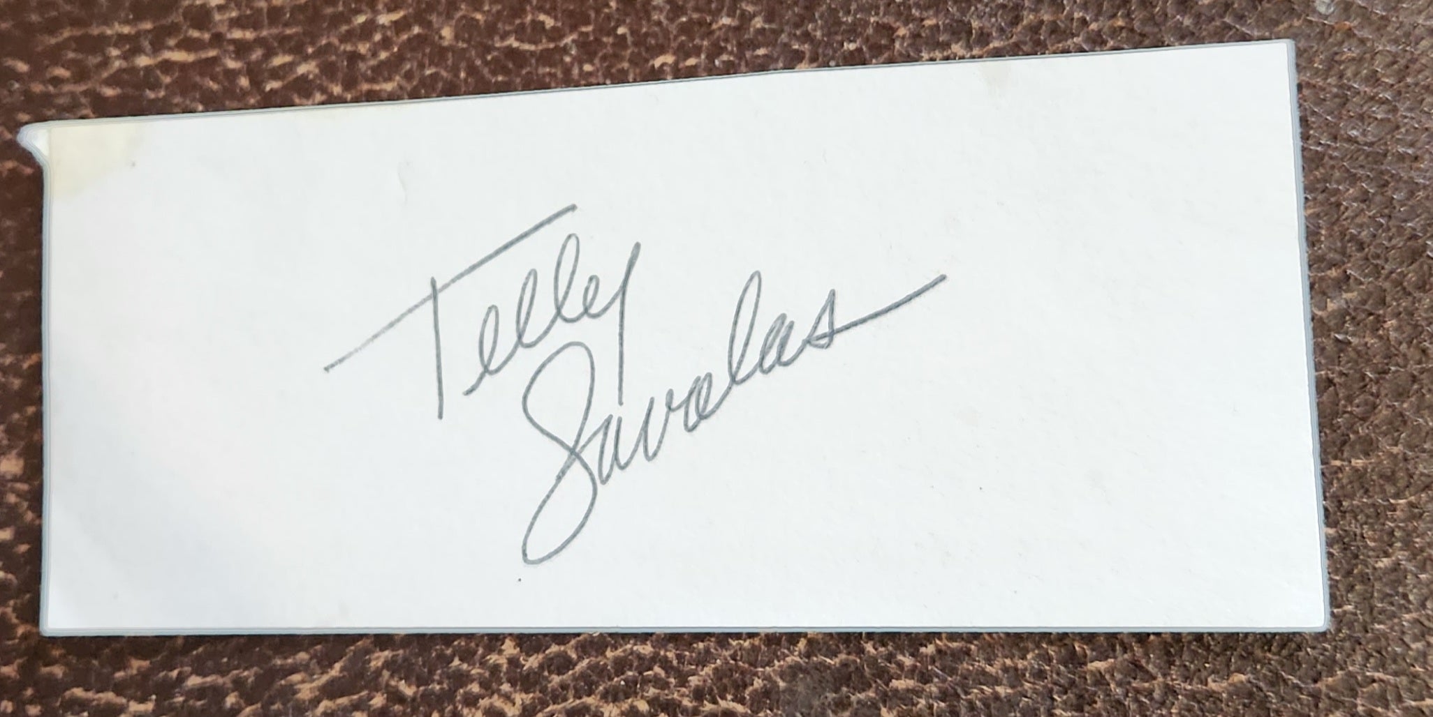 ACTOR TELLY SAVALES HAND SIGNED CUT CARD D.1994